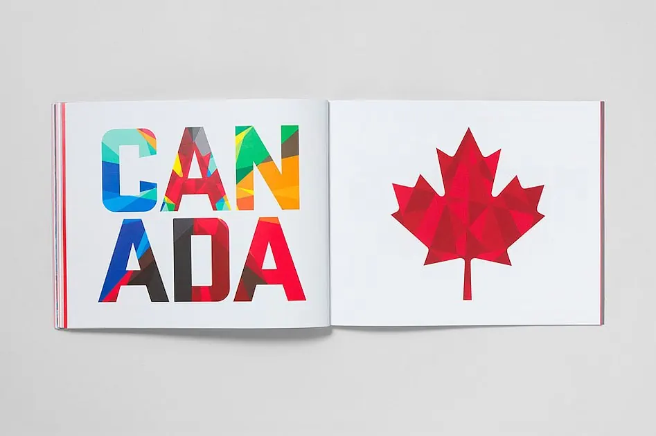 An open book with the word CANADA set in bold letters filled with colour on the left page and a red faceted maple leaf on the right.