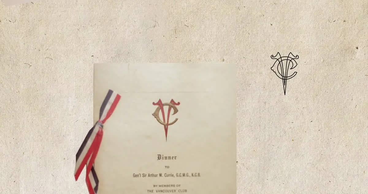 A historic club dinner menu tied with a red, white and blue ribbon, beside the monogram drawn in ink.